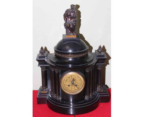 19th Century black marble 'architectural' design mantel clock, of semi circular form with columns and classical figure surmou