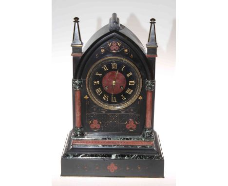 Victorian marble clock in Gothic style, having rouge and green marble half columns and decoration, 48cm.