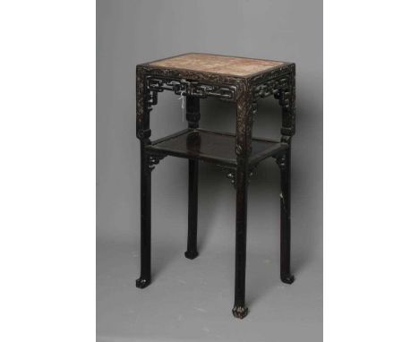 A CHINESE HARDWOOD JARDINIERE STAND, late 19th century, the oblong top inset with rouge marble, pierced frieze, raised on scr