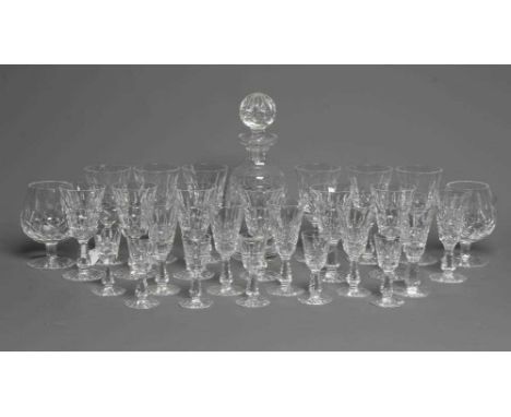 A WATERFORD KYLEMORE PATTERN GLASS TABLE SERVICE comprising six each red and white wines, sherry and liqueurs, decanter and s