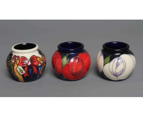 TWO MOORCROFT POTTERY RED AND WHITE ROSE SMALL VASES, 2015, designed by Emma Bossons, of globular form, together with a simil