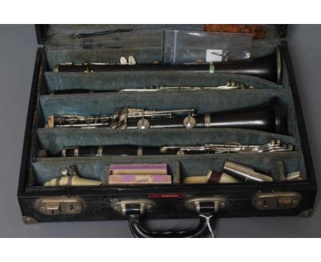 A BOOSEY AND HAWKES WESTMINSTER CLARINET, Serial No.169994, together with a Selmer Gold Seal clarinet, both polished wood, in