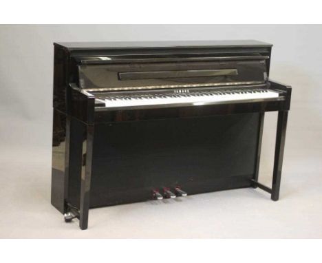 A YAMAHA "CLAVINOVA" ELECTRIC PIANO, modern, in upright ebonised case, 57 3/4" w x 18 3/4" d x 40" h, ensuite with an adjusta