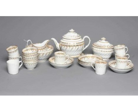 AN ENGLISH PORCELAIN PART TEA AND COFFEE SERVICE, probably Chamberlain's Worcester, of wrythen fluted form, gilded with patte