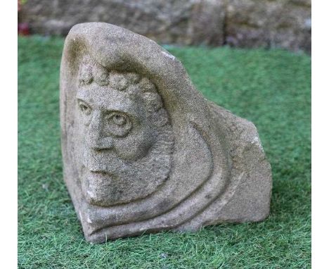 A CARVED SANDSTONE CORBEL modelled as a medieval style bearded male head, 10" w x 9" d x 9 1/2" h (Est. plus 24% premium inc.
