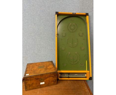 A Victorian walnut writing slope and a bagatelle board 