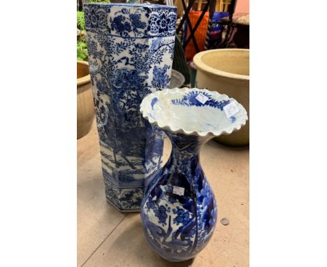 A Pearlware blue and white vase and a blue and white stick stand 