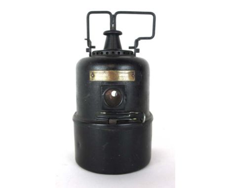 A Lamp Manufacturing and Railway Supplies Ltd. of London (L.M.S.) tole lamp, h. 29 cm