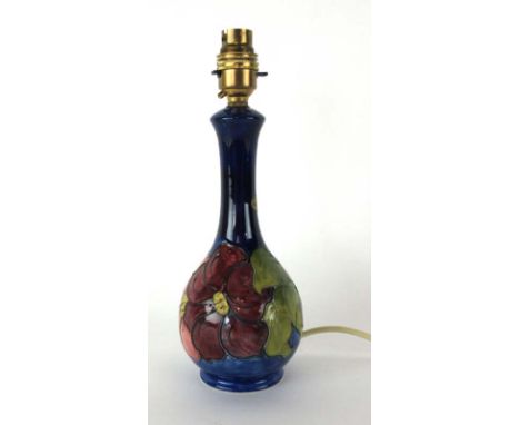 A Moorcroft table lamp base decorated in the 'Clematis' pattern, h. 28 cm