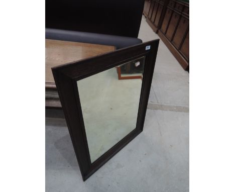 A vintage oak frame mirror