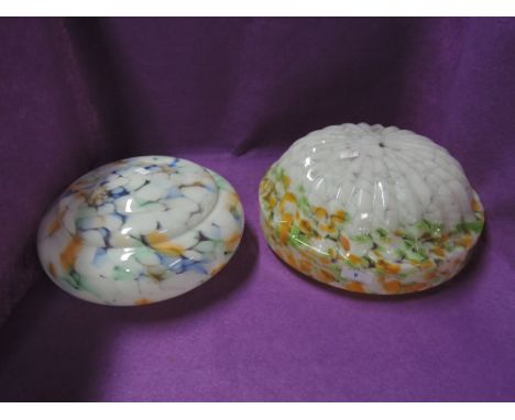 Two mottled and pressed glass light shades in art deco designs