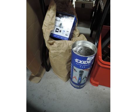 A selection of garage tools including Exide battery charger