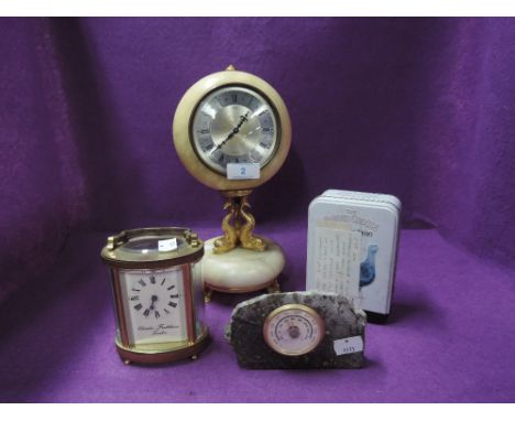 A selection of clocks and barometer including Charles Frodsham