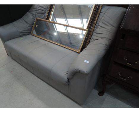 A vintage grey leatherette settee