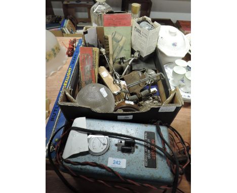 A selection of hardware including locks and glass light shade