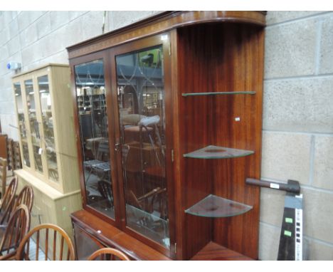 A modern wall unit including corner shelf