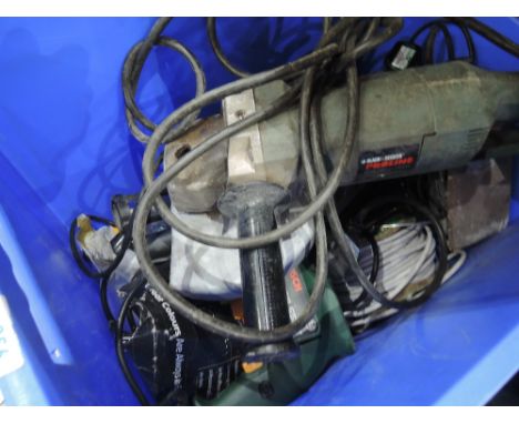 A selection of electric tools including grinder and circular saw 