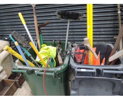 Two wheelie bins of tools