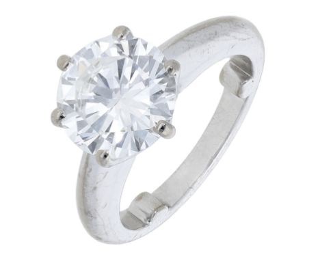 A solitaire diamond ring, the brilliant-cut diamond weighing 3.10 carats, in six claw setting, to a knife-edge shank stamped 