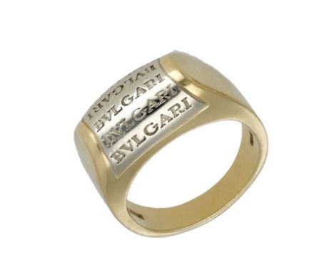 A dress ring by Bulgari, of bicoloured bombé form, signed ‘Bulgari’, stamped ‘750’, Italian assay marks, ring size L. £300-£5