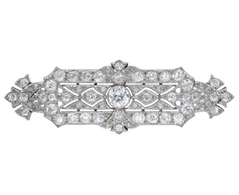 A diamond plaque brooch, circa 1925, the pierced rectangular brooch with fanned terminals and millegrain set throughout with 