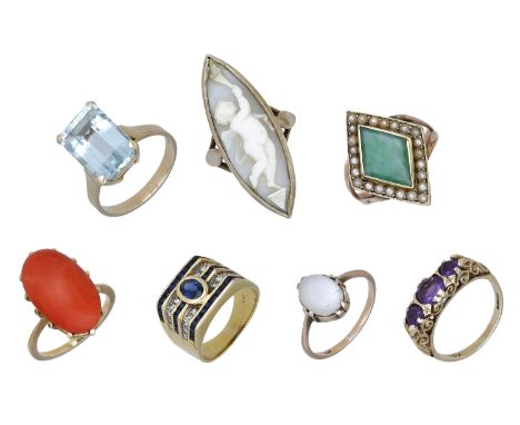 A collection of seven assorted rings, comprising a jade and seed pearl lozenge-shaped ring, a navette-shaped shell cameo ring