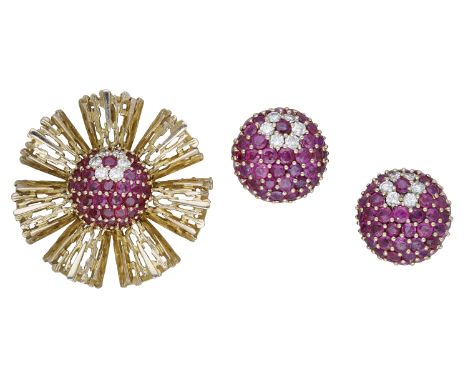 A pair of  ruby and diamond ear clips by Kutchinsky, 1961, the bombé design set throughout with round-cut rubies, each with d