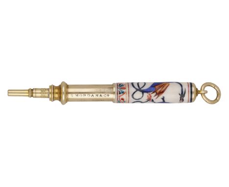 A gold and enamelled propelling pencil by Sampson Mordan & Co, the outer sleeve enamelled with colourful dragons over a guill