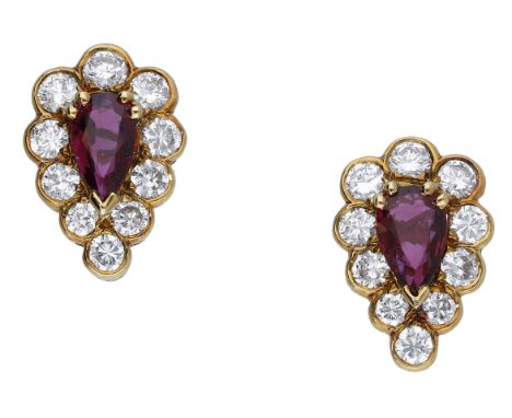 A pair of 18ct gold ruby and diamond cluster ear studs retailed by Garrard & Co., each comprising a pear-shaped ruby claw-set