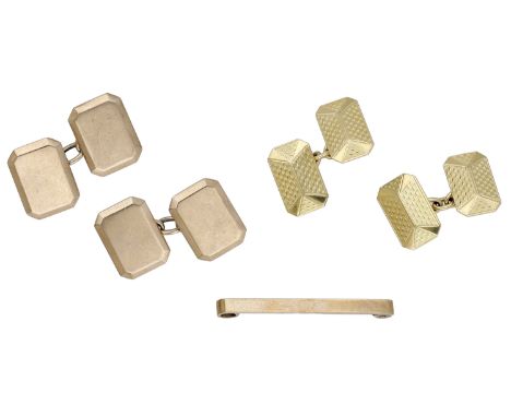 Two pairs of cufflinks and a tie pin, the first with rectangular engine-turned panels and chain connections, stamped ‘18ct’, 