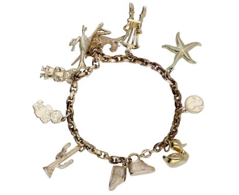 A 9ct charm bracelet, the belcher-link chain bracelet suspending a total of 10 charms, including a duck, rocking chair and st