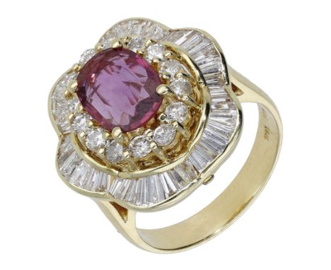 A ruby and diamond cluster ring / pendant combination, the oval-cut ruby in an undulating surround of brilliant and calibré-c