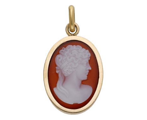 A 19th century hardstone cameo pendant, French, carved to depict the profile of a lady, her curled hair tied with a bow, coll