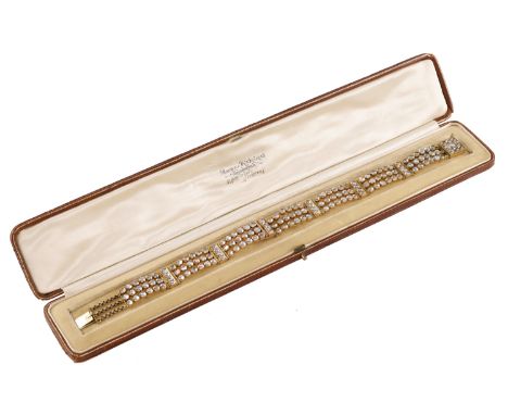 A moonstone bracelet / choker combination, late 19th century, the pair of bracelets designed as three rows of circular moonst
