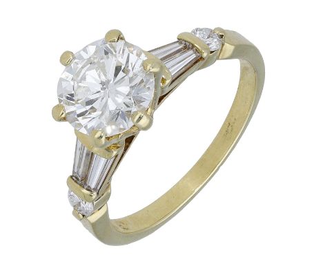 A diamond single stone ring, the brilliant-cut diamond, weighing 1.42 carats, in a six-claw setting, between baguette-cut dia