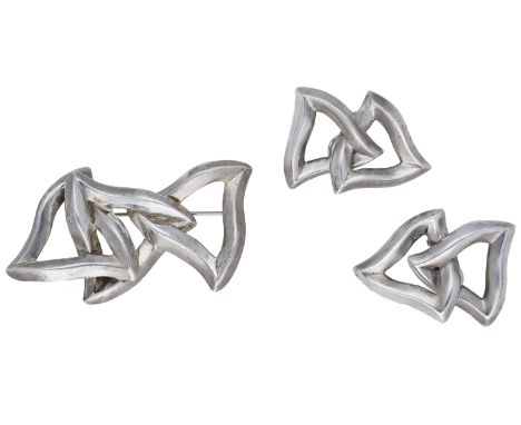 A silver brooch and earring suite by Angela Cummings, the brooch of entwined openwork design, the ear clips en suite, stamped