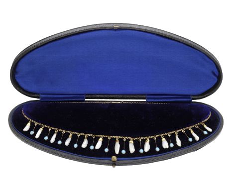 An early 20th century gold turquoise and pearl necklace, circa 1900, the cable-link necklace chain suspending a fringe of bar