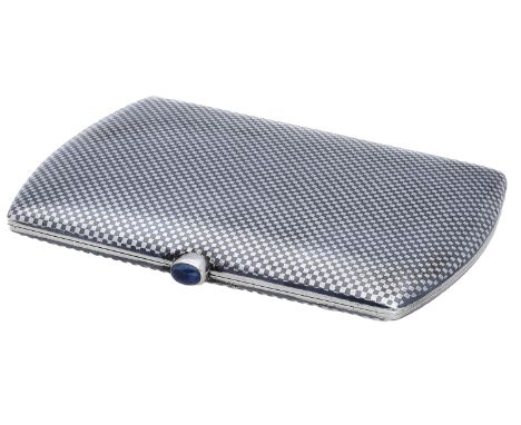 A silver and niello cigarette case, of shaped rectangular form with bowed ends, chequered decoration throughout, with cabocho