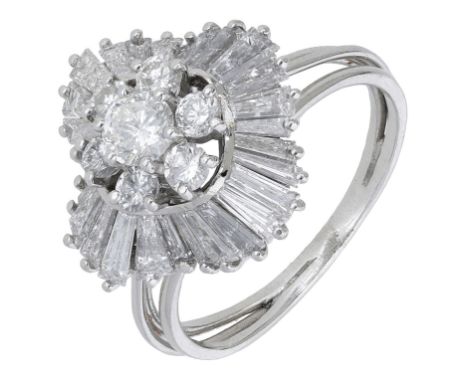 A diamond ballerina ring, set throughout with brilliant and calibré-cut diamonds, between trifurcated shoulders, total diamon