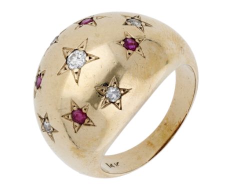 A diamond and ruby bombé dress ring, circa 1940, bezel-set to the front with vari-cut diamonds and circular-cut rubies within