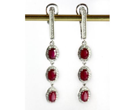 A pair of 925 silver ruby and white stone set drop earrings, L. 5cm.