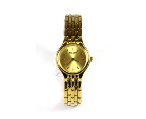 A lady's boxed Tissot wrist watch.