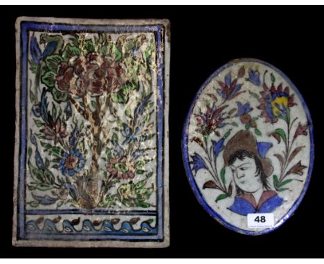 Islamic interest, two 19th century or earlier Persian hand painted ceramic tiles, largest 33 x 22cm.