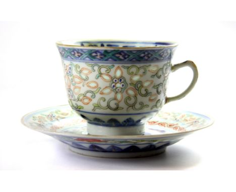 An early Chinese hand painted and rice grain glazed cup and saucer decorated with phoenix, Dia. 12.5cm. Cup handle restored. 