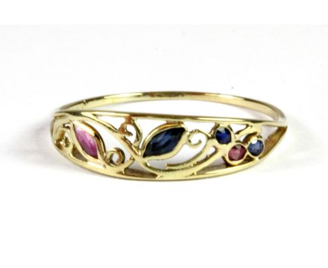 A yellow metal (tested minimum 9ct gold) ring set with sapphires and a ruby, (P).