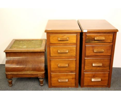 A pair of mahogany four drawer chests and an early commode.