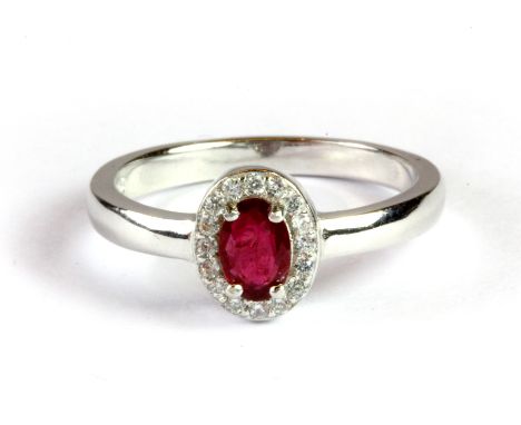 A 925 silver ruby and  white stone set cluster ring, (N.5).