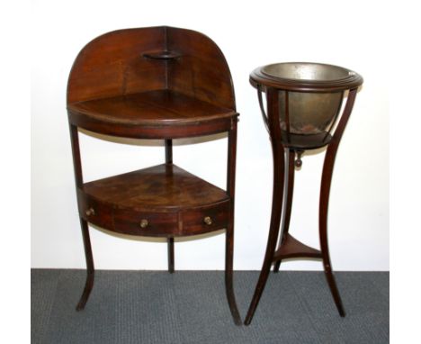 A Georgian mahogany corner wash stand with a wood and brass planter.