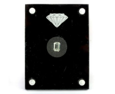 An unmounted 1ct emerald cut diamond, together with a W. G. I. certificate, colour K, clarity SI1.