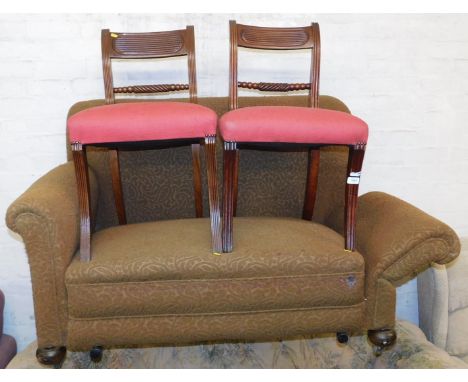 A pair of Regency mahogany dining chairs, together with an early 20thC two seater sofa. (3)
